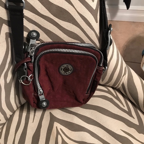 kipling organizer bag